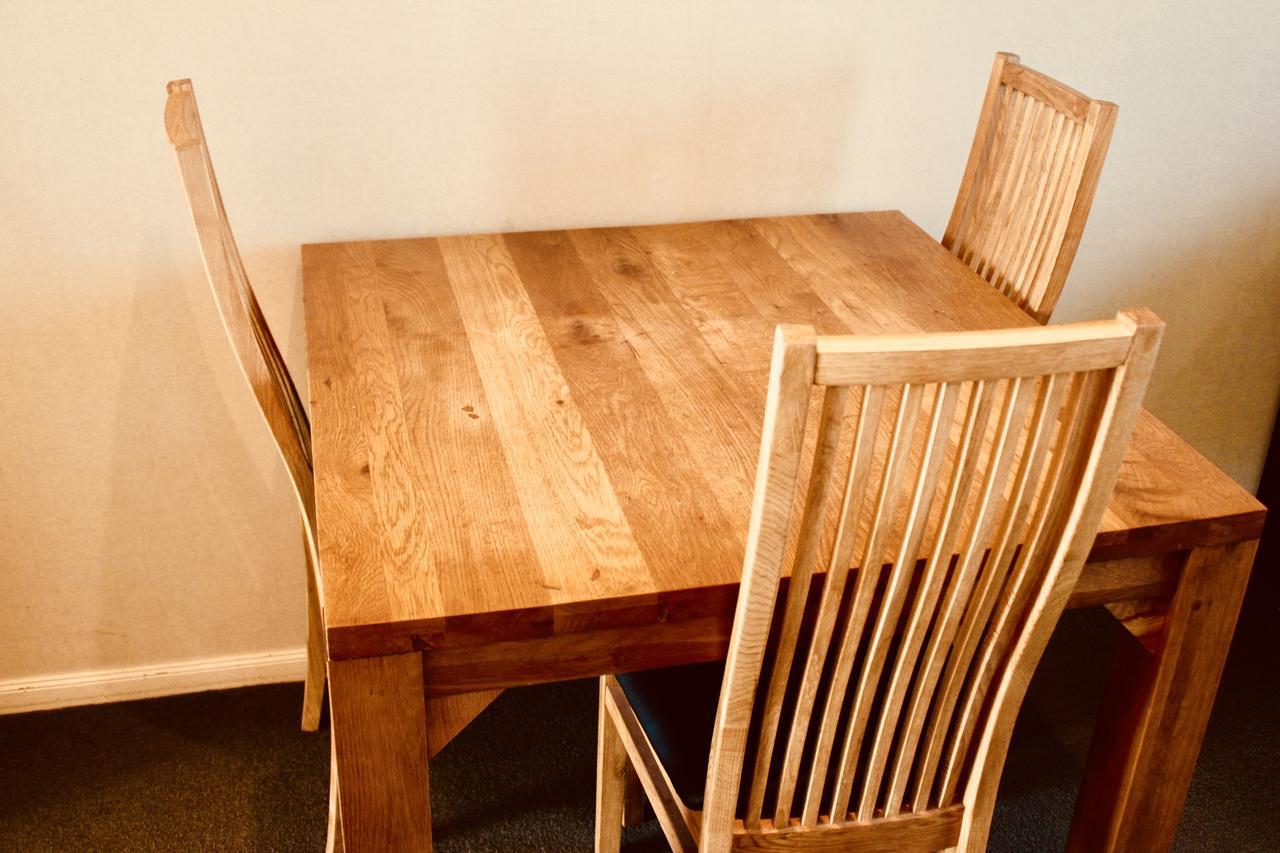 Hotel The Nautilus Napier Esterno foto A dining table and chairs